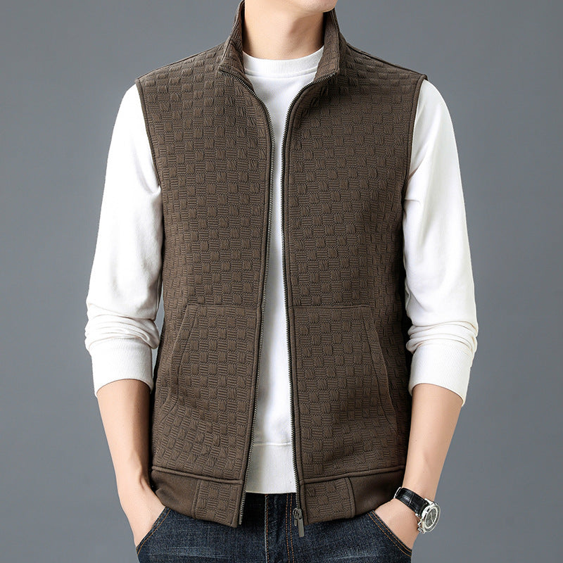 Brown casual sleeveless top waistcoat vest with zipper and textured fabric worn over white long sleeve shirt