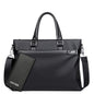 Large capacity black soft leather business handbag men's briefcase with detachable shoulder strap and matching wallet.