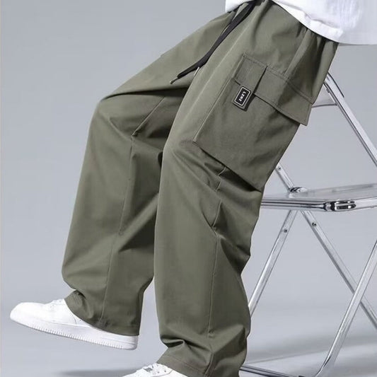 Boys army green loose pockets drawstring cargo pants with straight fit and mid waist design