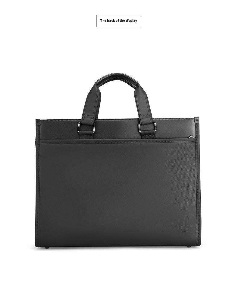 Black men's business handheld notebook computer briefcase with dual handles and exterior pocket made of Oxford cloth.