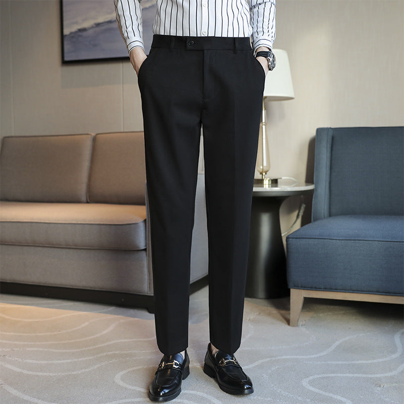 Straight retro slim fit black casual pants with elastic waist and straight cut, styled for light business wear.