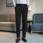Straight retro slim fit black casual pants with elastic waist and straight cut, styled for light business wear.