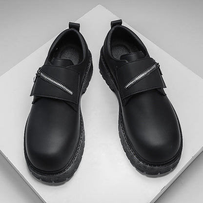 Black casual new platform leather shoes for men with low top design and zipper strap closure.