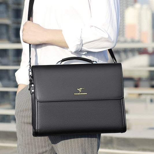 Black men's horizontal leather portable briefcase with top handle and shoulder strap for business commute.