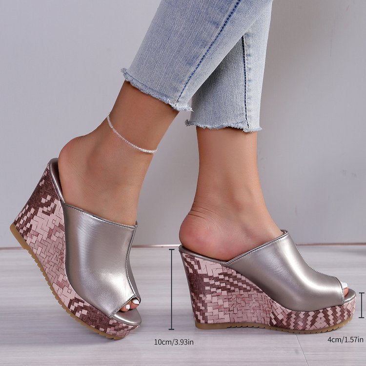 Women's Fashion European style Roman wedge shoes in metallic silver with fish mouth design worn with light denim jeans