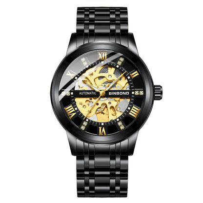 Men's automatic mechanical watch with black metal strap and gold skeleton dial, luminous hands, and Roman numeral markers