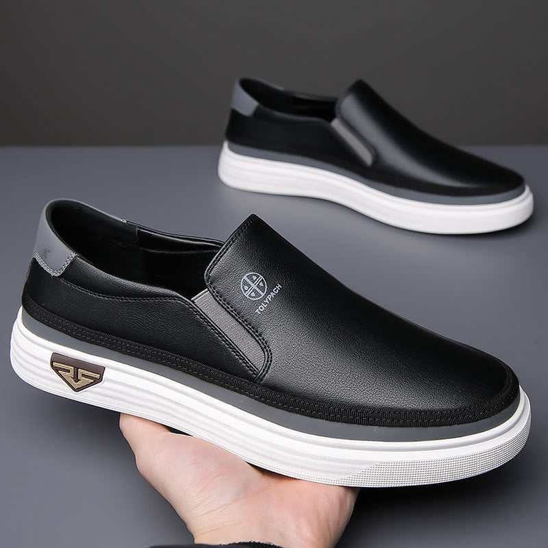 Black men's lazy slip on casual leather shoes with white rubber sole and round toe design